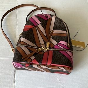 MK Rhea zip back pack. New with tags